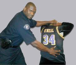 Shaquille O'Neal as Miami Cop